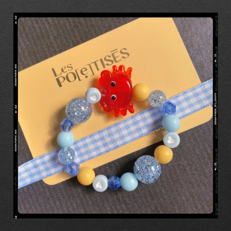 Les Poétisés bracelet enfant crabe bleu jaune rouge plage vacances été