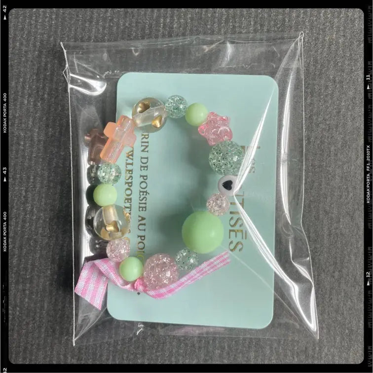 Les Poétisés bracelet enfant croix vert rose cadeau catho
