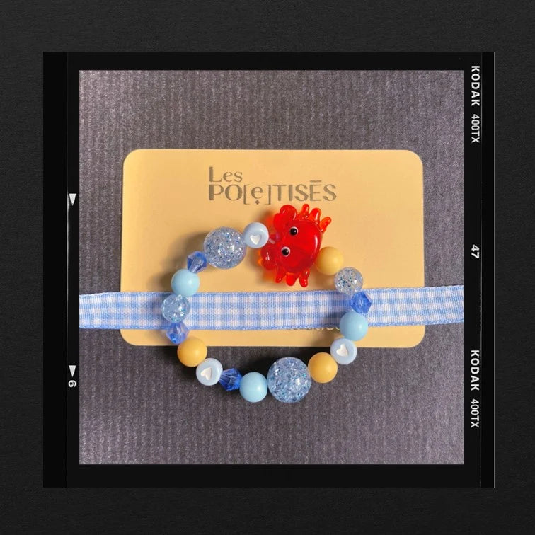 Les Poétisés bracelet enfant crabe bleu jaune rouge fille garçon été