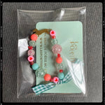 Les Poétisés bracelet enfant personnalisale paillettes vert  médaille gravée chien