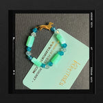 Les Poétisés bracelet enfant personnalisable vert mixte gravure médaille chien teckel